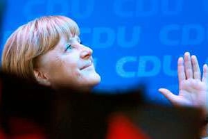 Victoire écrasante d’Angela Merkel le 22 septembre (ici au QG de la CDU, à Berlin). © Michael Kappeler/AFP