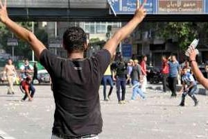 Heurts entre partisans et opposants du président déchu Mohamed Morsi, le 4 octobre 2013 au Caire. © AFP