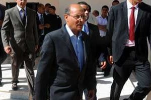 Le président tunisien Marzouki à la sortie de la cérémonie à laquelle il n’a pu assister. © Fethi Belaïd