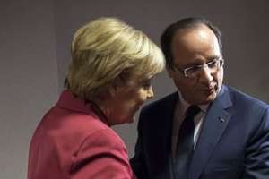 La Chancelière allemande Angela Merkel et le président français, le 24 octobre 2013 à Bruxelles. © Reuters