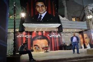 Des posters de l’humoriste égyptien Bassem Youssef, au Caire, le 22 janvier 2013. © AFP