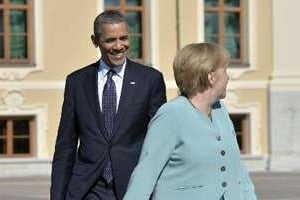 Barack Obama et Angela Merkel, le 6 septembre 2013 au G20 à Saint-Petersbourg. © AFP