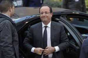 Le président François Hollande arrive à Bruxelles pour un sommet européen, le 19 décembre 2013. © AFP