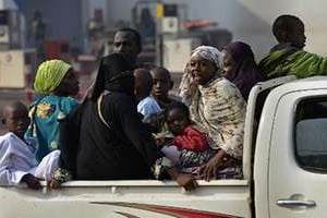Des Tchadiens fuient Bangui, le 28 décembre 2013. © AFP