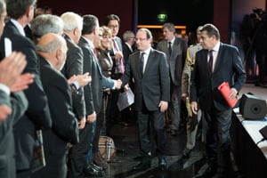 Le 3 décembre, à Paris, la société a fêté ses 30 ans en présence du chef de l’Etat, François Hollande (ici au côté de Xavier Beulin, président de Sofiprotéol). © LCHAM/SIPA.