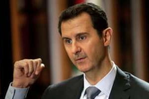 Bachar al-Assad lors de l’interview à l’AFP au palais présidentiel à Damas, le 19 janvier. © AFP