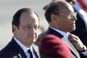 François Hollande (à g.) et Moncef Marzouki. © AFP