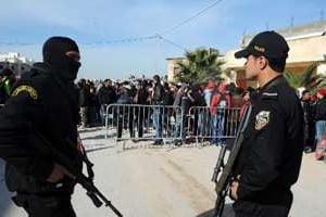 Des membres de la garde nationale le 4 février 2014 à Raoued dans la banlieue de Tunis. © AFP