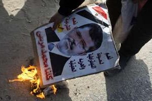 Symbole des Frères au pouvoir, Mohamed Morsi n’a tenu qu’un an et risque la peine de mort. © KHALED DESOUKI/AFP