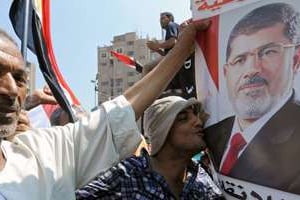 Des pro-Morsi en juillet 2013, au Caire. © AFP