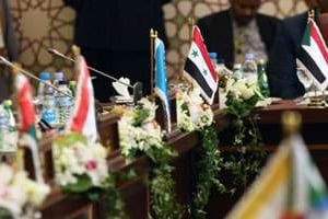Table au sommet de la Ligue arabe, le 25 mars 2014, au Koweït. © AFP
