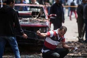Une scène du triple attentat à la bombe au Caire, le 2 avril 2014. © AFP