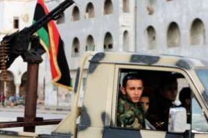 En Libye, les forces de l’ordre sont essentiellement constituées de miliciens. © AFP
