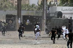 Des affrontements entre la police et des étudiants de l’université du Caire, le 16 mai 2014. © AFP