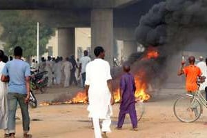 Une émeute dans la ville de Kano, au nord du Nigeria, le 8 juin 2014. © AFP