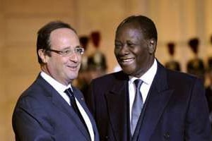 François Hollande et Alassane Ouattara, le 4 décembre 2013 à Paris. © Mehdi Fedouach/AFP