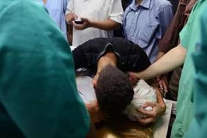 Un homme tué par un raid israélien à Nuseirat, dans Gaza City, le 9 août 2014. © AFP