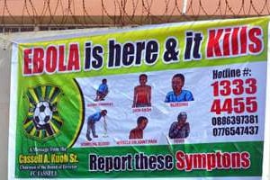 Une affiche de prévention concernant le virus Ebola, le 19 août 2014 à Monrovia. © AFP