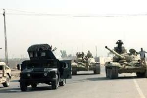 Des soldats irakiens déployés le 18 août 2014 dans la province d’Anbar. © AFP
