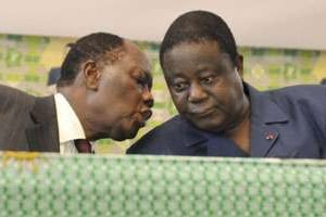 Alassane Dramane Ouattara (g.) et Henri Konan Bédié. © AFP