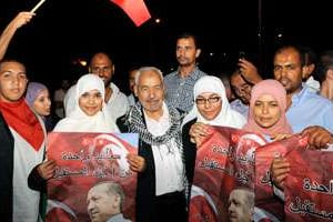 Rached Ghanouchi et les siens ont réservé un accueil triomphal à Erdogan. © Fethi Belaïd / AFP