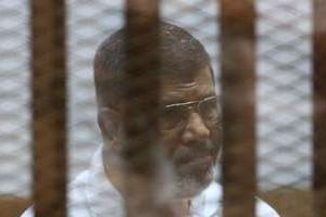 L’ancien président égyptien destitué Mohamed Morsi, lors de son procès au Caire, le 18 août 201 © AFP