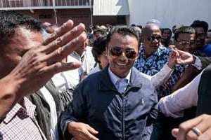 L’ancien président malgache Marc Ravalomanana (c), le 13 octobre 2014 à Antananarivo. © AFP