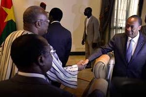 Blaise Compaoré et des leaders de l’opposition, à Ouagadougou le 23 septembre 2014 © Ahmed Ouoba/AFP