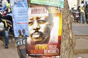 Portrait du journaliste Nobert Zongo affichée à Ouagadougou, le 13 décembre 2014. © AFP