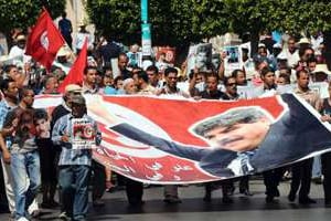 Tunis le 27 juillet 2013 lors des funérailles de l’opposant de gauche Mohamed Brahmi. © AFP