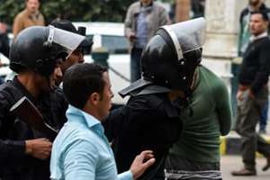 Arrestation des manifestants au Caire, le 24 janvier 2015. © AFP