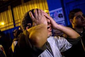 Le père d’un supporteur de Zamalek décédé le 8 février lors de heurts avec la police au Caire. © Hamada Elrasam/AFP