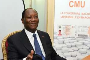 Alassane Ouattara a lancé la Couverture maladie universelle. © Sia Kambou/AFP