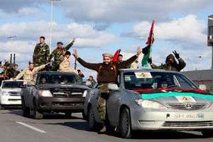 Des miliciens libyens paradent à Tripoli, en février 2012 © Abdel Magid al Fergany/AP/SIPA