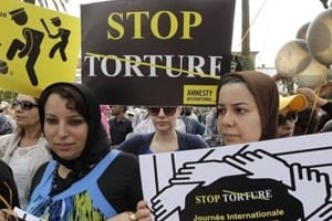 Manifestation contre la torture, avec Amnesty International, à Rabat, le 26 juin 2014. © Reuters