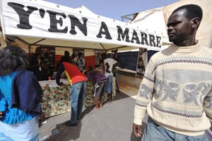Un stand du mouvement citoyen sénégalais « Y’en marre », le 22 janvier 2012 à Dakar. © Seyllou/AFP