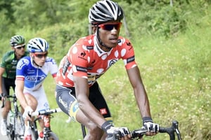 Daniel Teklehaimanot lors d’une échappée pendant la deuxième étape du Critérium du Dauphiné, le 8 juin. © Eric Feferberg/AFP