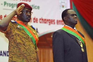 Isaac Zida et Michel Kafando à Ouagadougou le 21 novembre 2014. © Sia Kambou/AFP