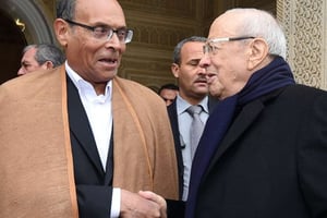 Moncef Marzouki aux côtés du nouveau président Béji Caid Essebsi, en décembre 2014. © AP/SIPA
