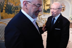 Le président Béji Caïd Essebsi (à dr.) avec le leader d’Ennahdha, Rached Ghannouchi, le 14 janvier 2015, au palais de Carthage. © FETHI BELAID/AFP