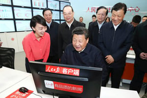 Le président en visite au siège du Quotidien du peuple, le 19 février. © PANG XINGLEI/XINHUA-REA