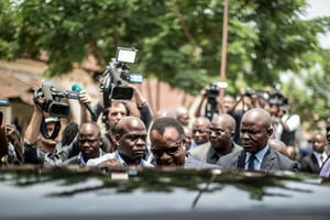 Denis Sassou Nguesso quitte un bureau de vote à Brazzaville, le 20 mars 2016. © Marco Longari/AFP
