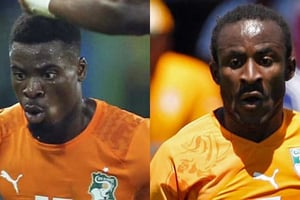 Les footballeurs ivoiriens Serge Aurier et Seydou Doumbia. © Sunday Alamba / Jean-Christophe Bott / AP / SIPA