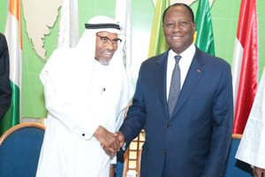 Le président ivoirien Alassane Ouattara et Ahmad Mohamed Ali, président de la Banque islamique de développement en décembre 2014 au siège de la BID à Djeddah, en Arabie saoudite. © DR