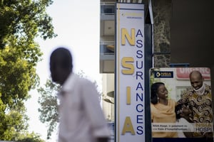 Enseigne de la compagnie d’assurances NSIA, dans le centre de Dakar, le 3 février 2014. © Sylvain Cherkaoui/JA