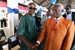 Laurent Akoun et Aboudramane Sangaré lors de la commémoration de l’arrestation de Gbagbo, le 11 avril 2017, à Abidjan. © Olivier pour JA