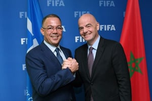 Le patron du foot chérifien (à g.) avec Gianni Infantino, président de la Fifa,le 20 septembre 2016, à Zurich. © Foto-net.