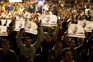 Manifestants brandissant des affiches à l’effigie du leader de la contestation,le 29 mai,à Al Hoceima. © FADEL SENNA/AFP