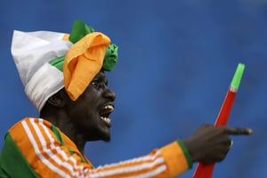 Un supporter de l’équipe de football de Côte d’Ivoire. © Themba Hadebe/AP/SIPA