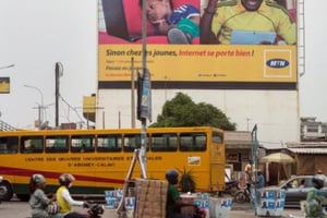 Une affiche de l’opérateur de téléphonie mobile MTN à Cotonou, au Bénin © Gwenn Dubourthoumieu pour Jeune Afrique